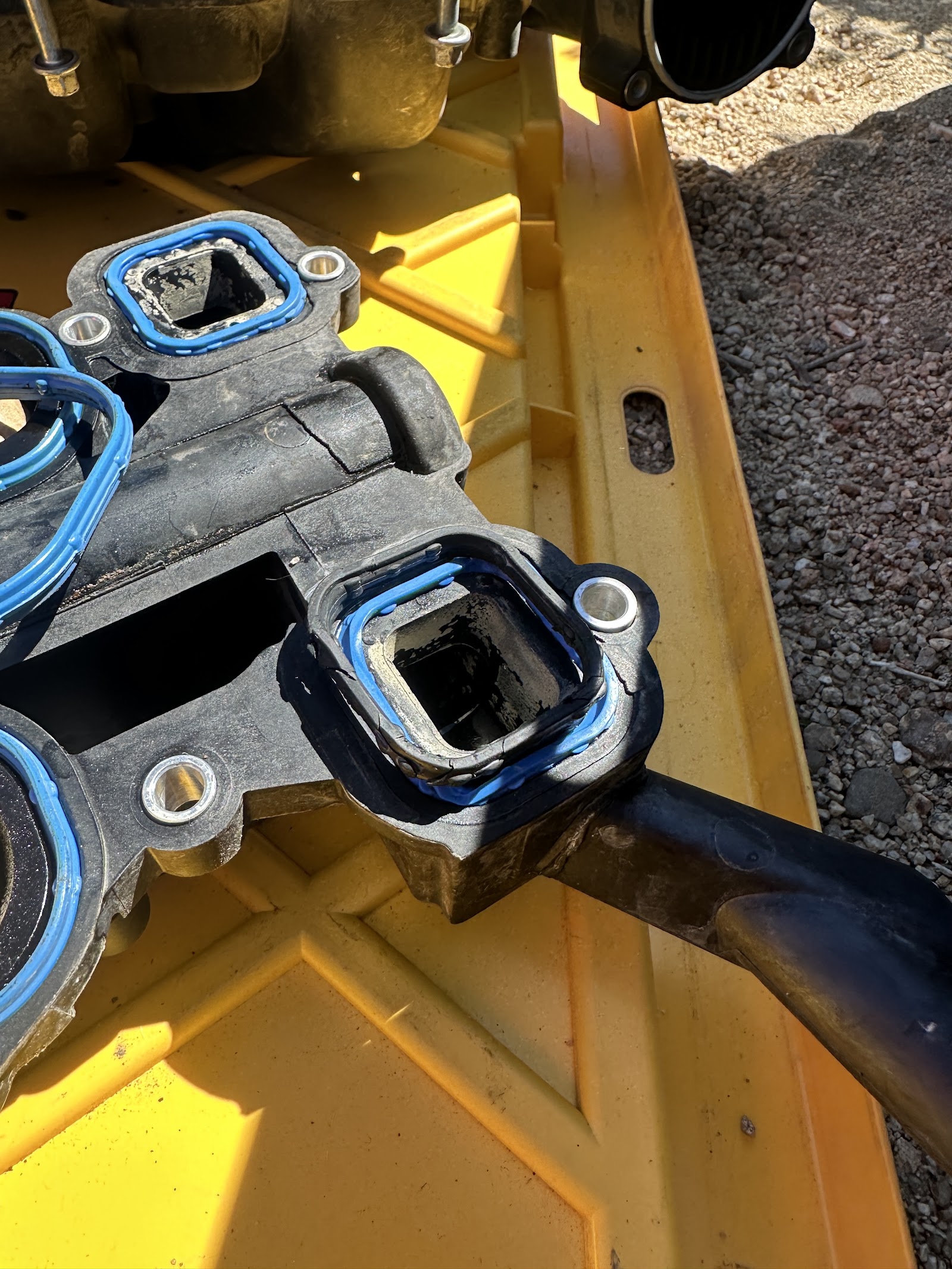 Close-up of intake manifold gaskets during engine repair